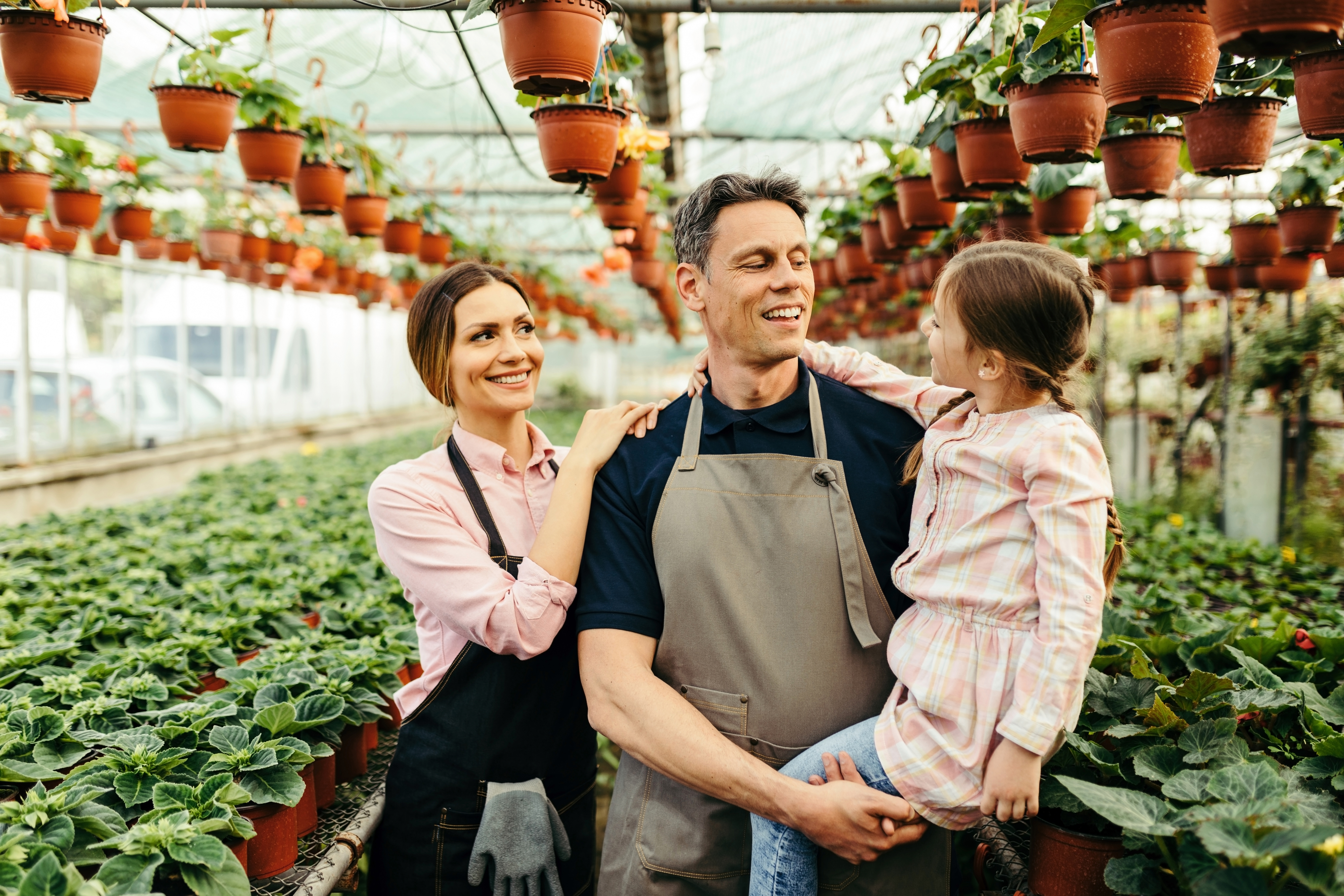 Family visiting the Metis Garden greenhouse